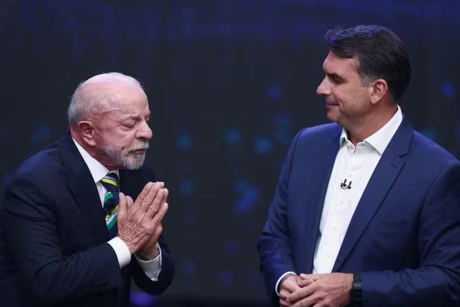  Lula defende saidinha de presos, e Flávio Bolsonaro cobra rigor na segurança pública durante debate na Band